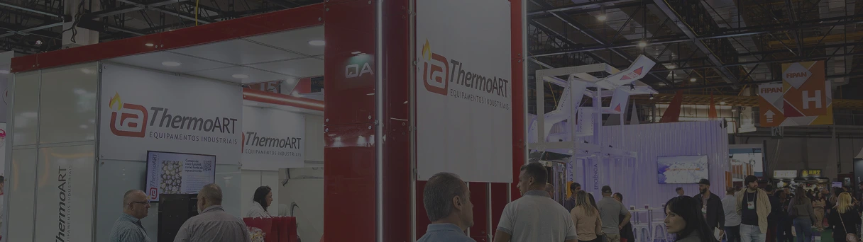 Estande da ThermoART em feira do setor alimentício e industrial, destacando equipamentos industriais de panificação e confeitaria.